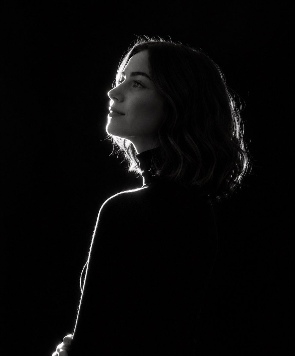 Monochrome Side-Profile Emerging From Darkness