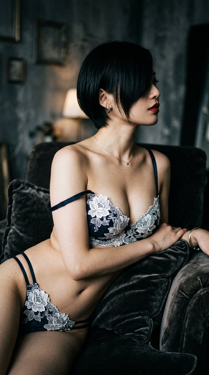 Dramatic Chiaroscuro Boudoir Portrait with Floral Lace Lingerie