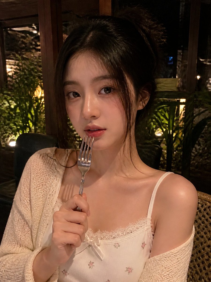 Realistic Low-Light Smartphone Restaurant Portrait of a Young Adult