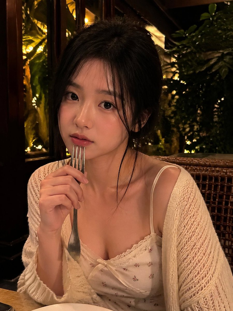 Realistic Low-Light Smartphone Restaurant Portrait of a Young Adult