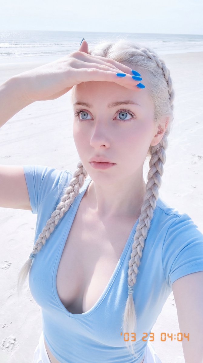 Ultra-realistic iPhone selfie of a woman on a beach