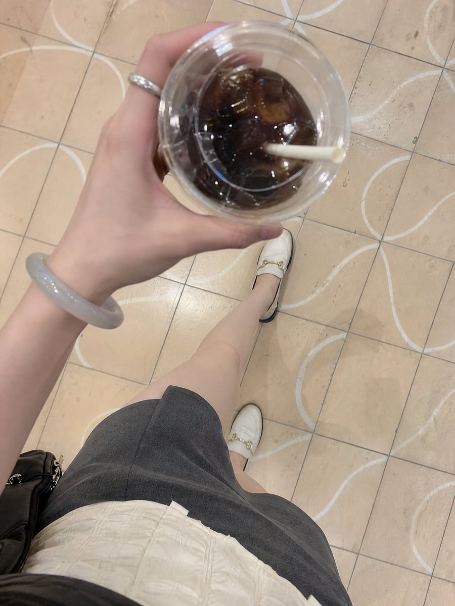 First-Person Casual Outfit Snapshot with Drink