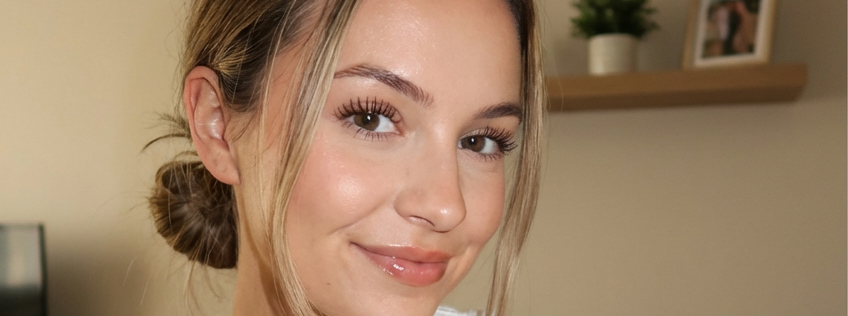 Portrait of a Young Woman with Messy Bun