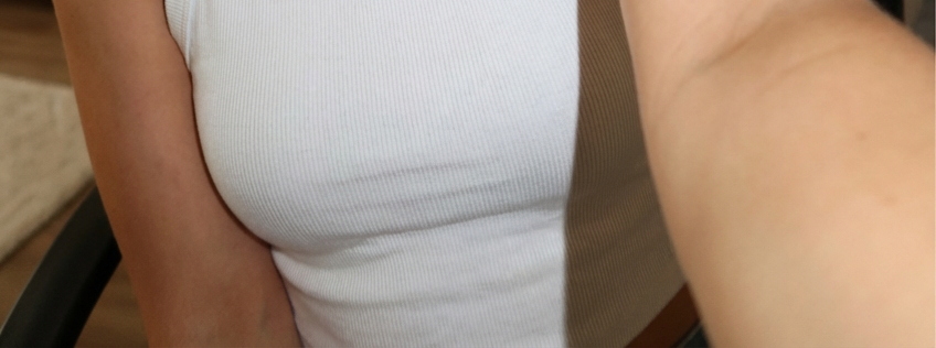 Portrait of a Young Woman with Messy Bun